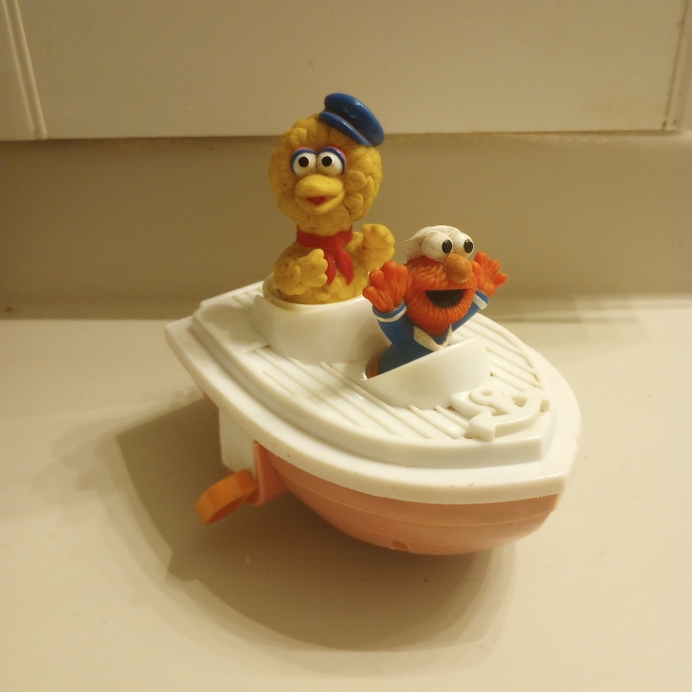 Tyco Sesame Street Big Bird and Elmo vintage wind up toy from the 90's
